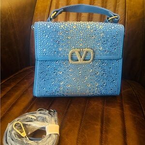 Valentino-style blingy bag.